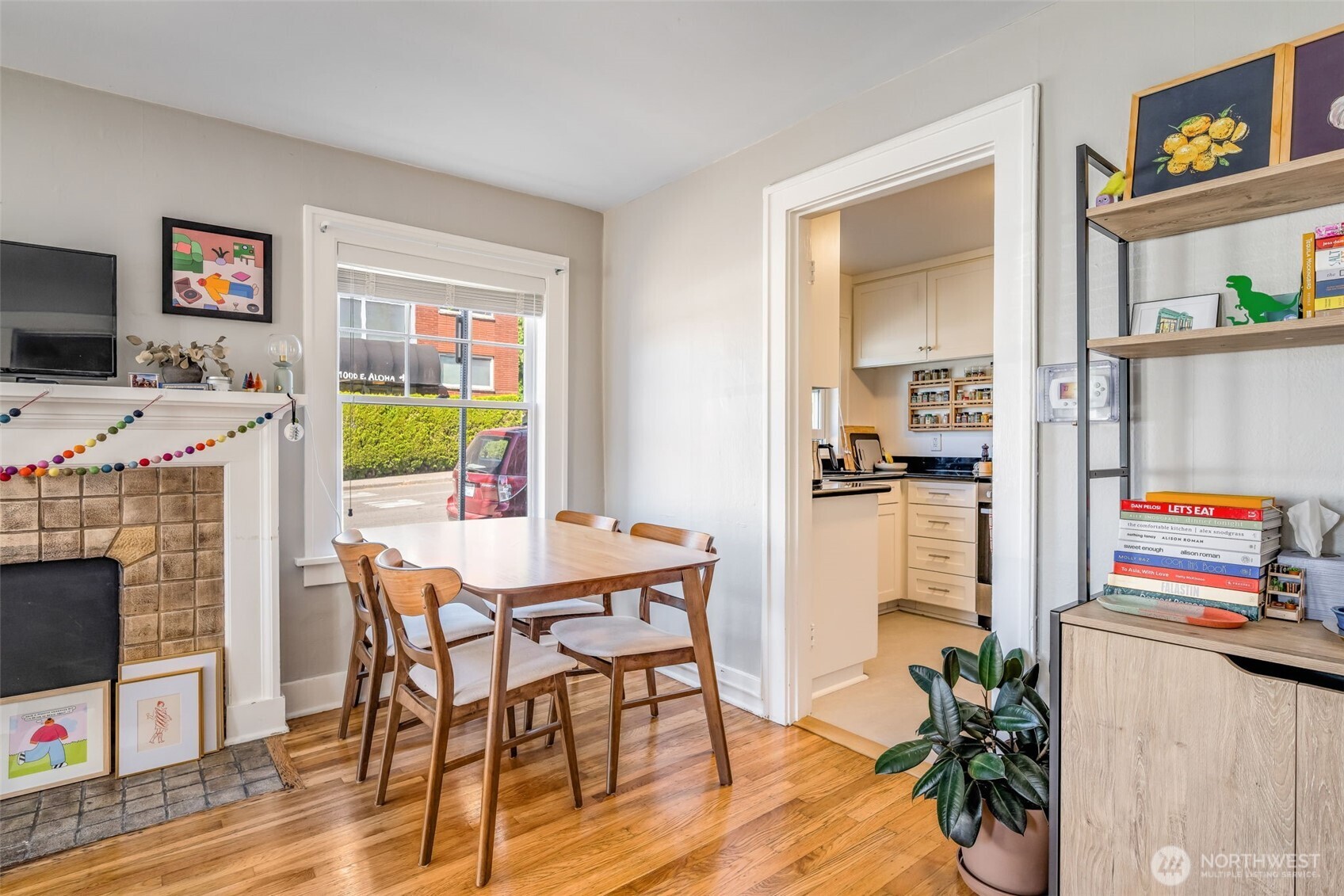 746 10th Avenue East Seattle, WA 98102 - Photo 16 of 34 a view of a workspace with furniture and a fireplace