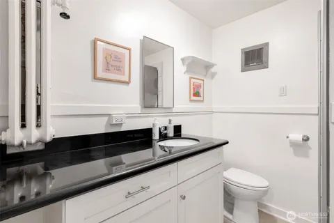 a bathroom with a sink and a toilet