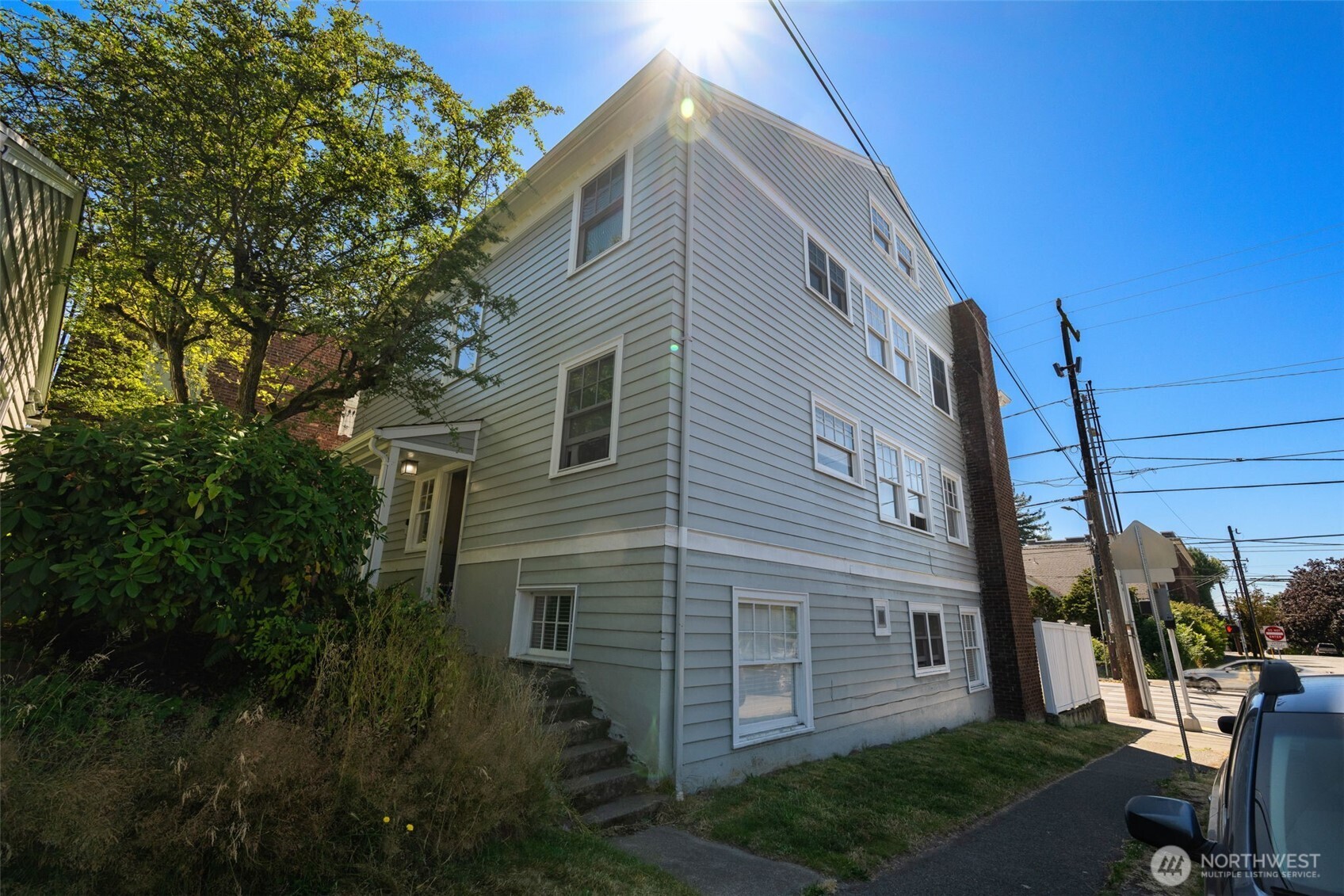 746 10th Avenue East Seattle, WA 98102 - Photo 30 of 34 a backyard of a house with lots of green space