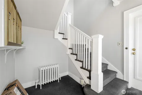 a view of entryway with stairs