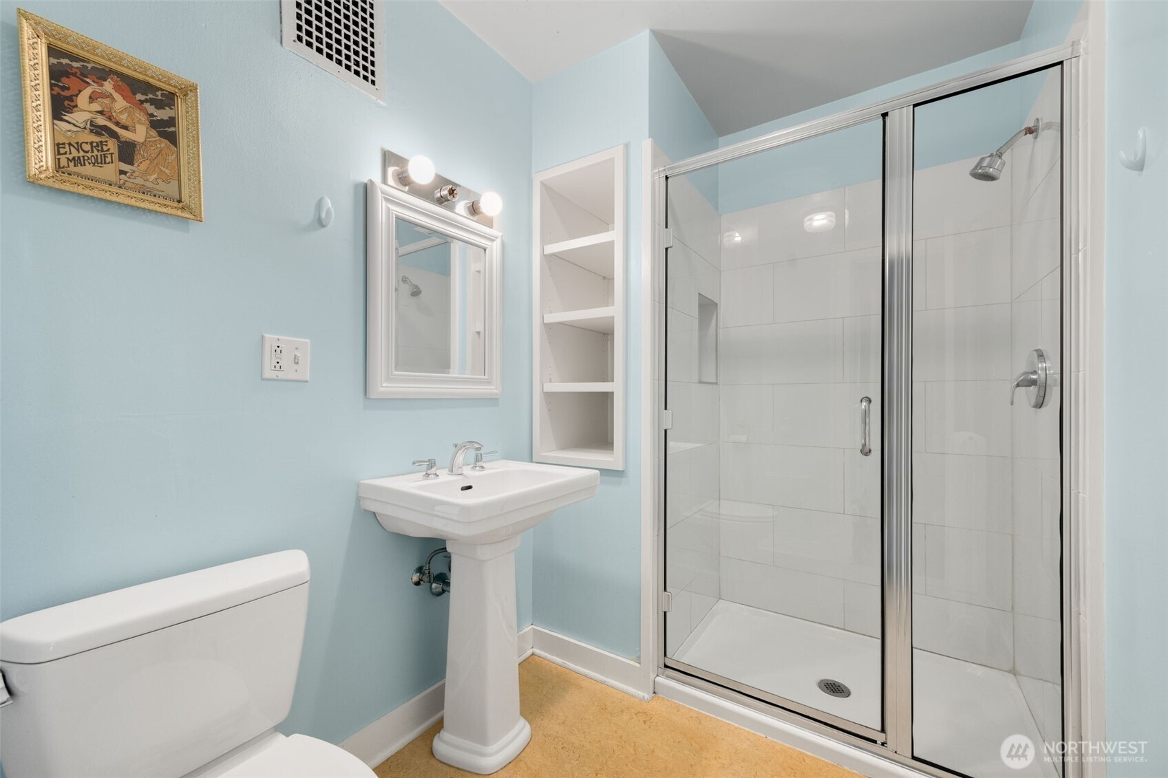 746 10th Avenue East Seattle, WA 98102 - Photo 10 of 34 a bathroom with a sink mirror toilet and shower