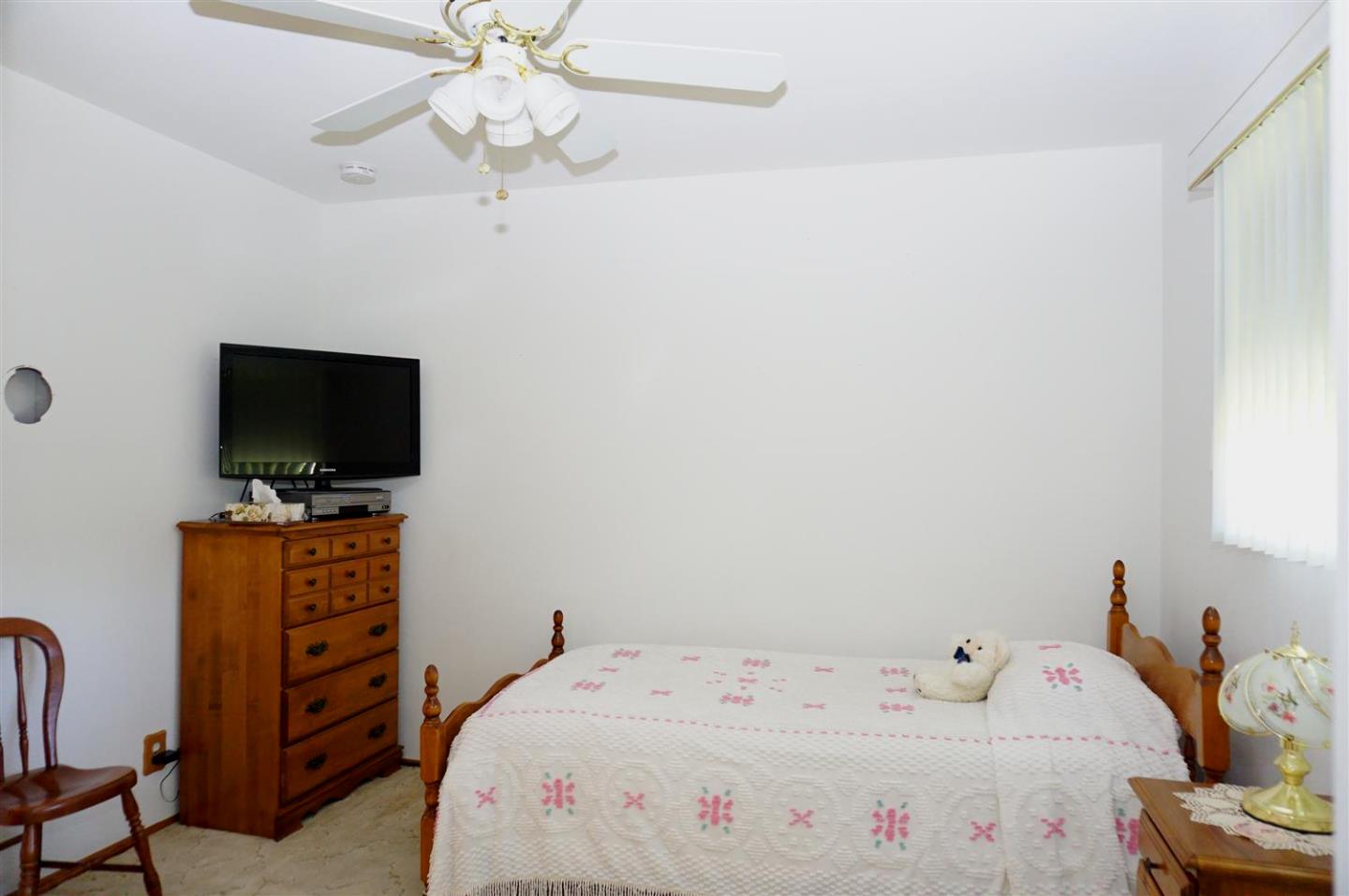 1116 Buchanan Drive Santa Clara, CA 95051 - Photo 19 of 30 a bedroom with a bed and flat screen tv