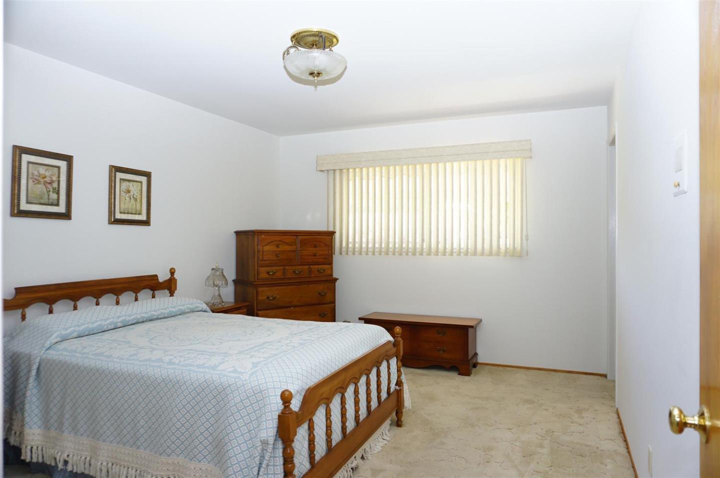 1116 Buchanan Drive Santa Clara, CA 95051 - Photo 21 of 30 a bedroom with a bed and a window