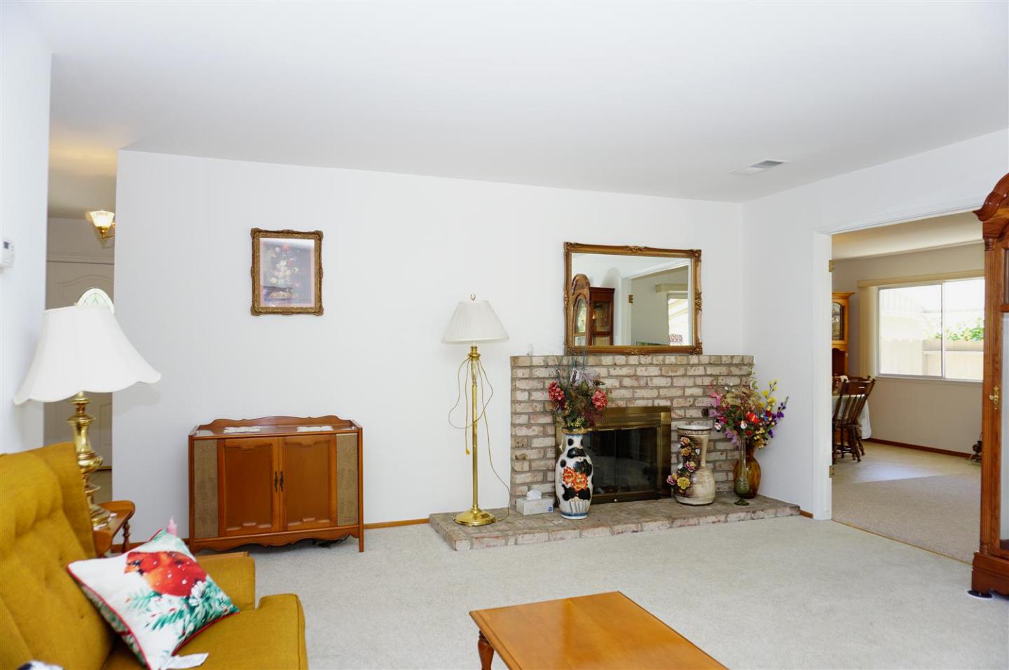 1116 Buchanan Drive Santa Clara, CA 95051 - Photo 6 of 30 a living room with furniture and a fireplace