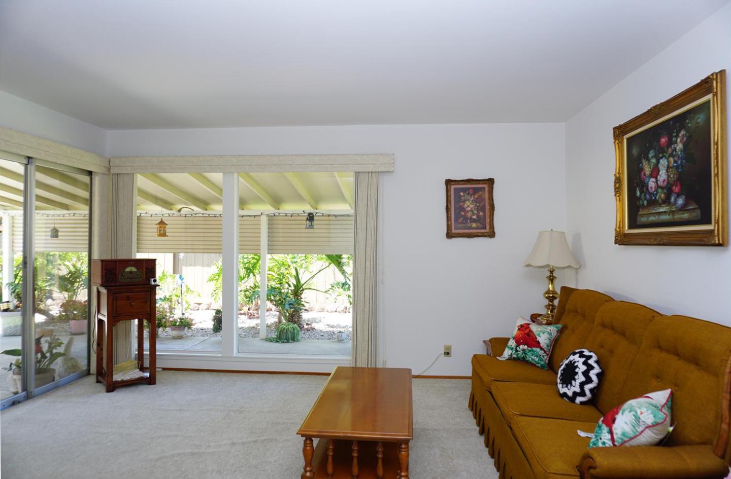 1116 Buchanan Drive Santa Clara, CA 95051 - Photo 8 of 30 a living room with furniture and a large window