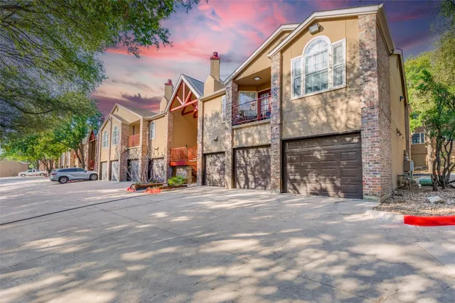 a view of a building with a street
