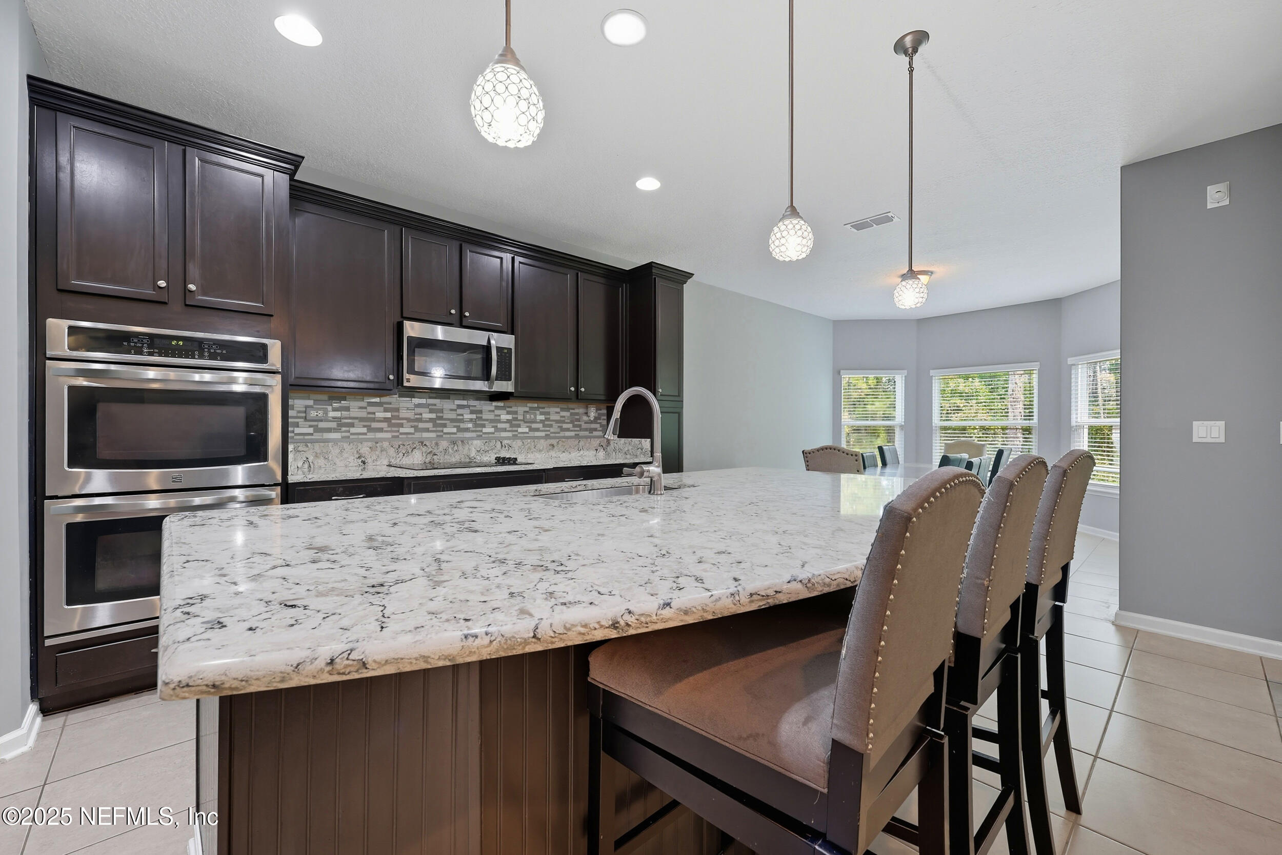 1218 Wetland Ridge Circle Middleburg, FL 32068 - Photo 20 of 75 Kitchen to Dining Area