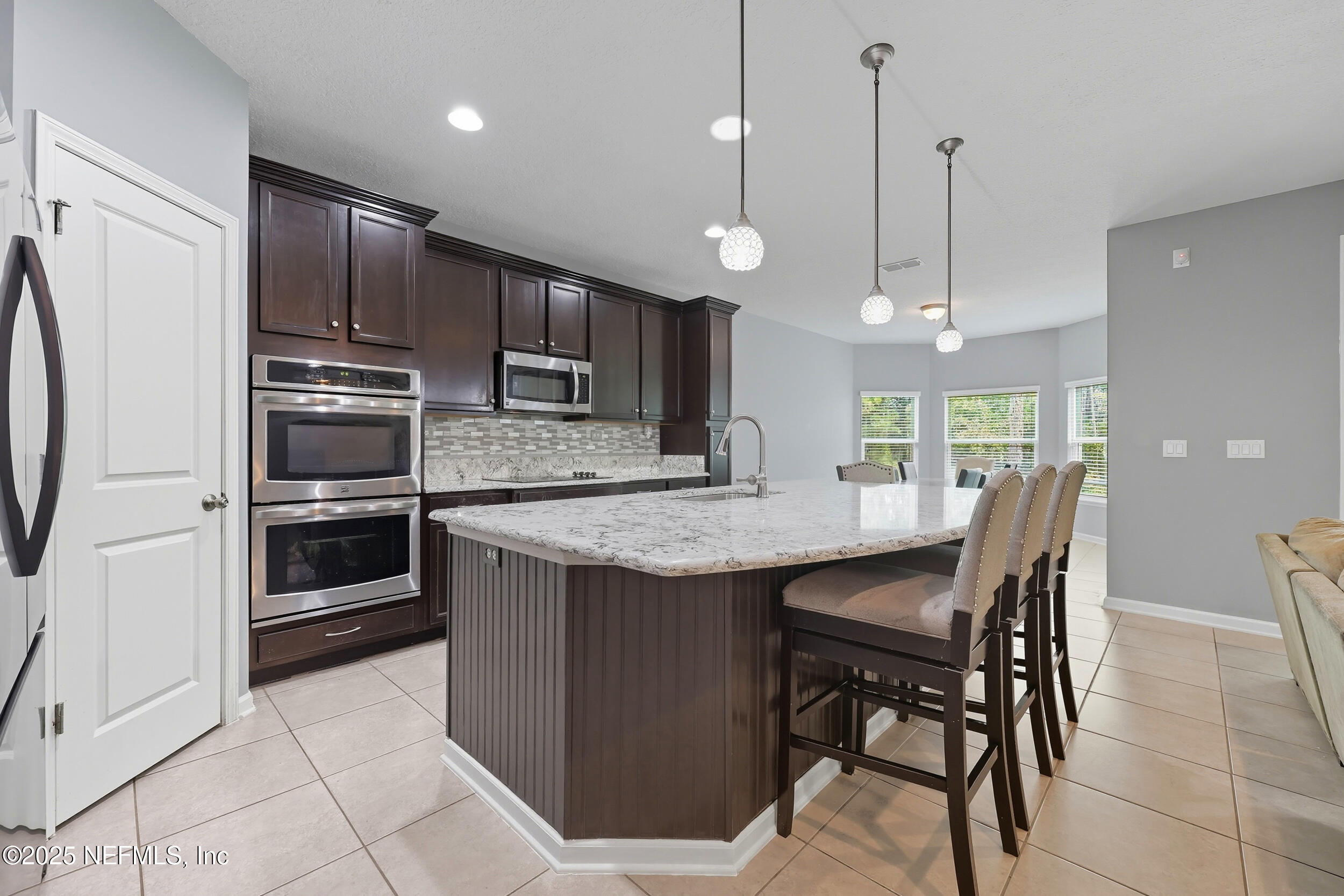 1218 Wetland Ridge Circle Middleburg, FL 32068 - Photo 23 of 75 Kitchen to Pantry & Dining Area