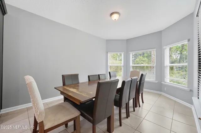 a view of a tree with a yard