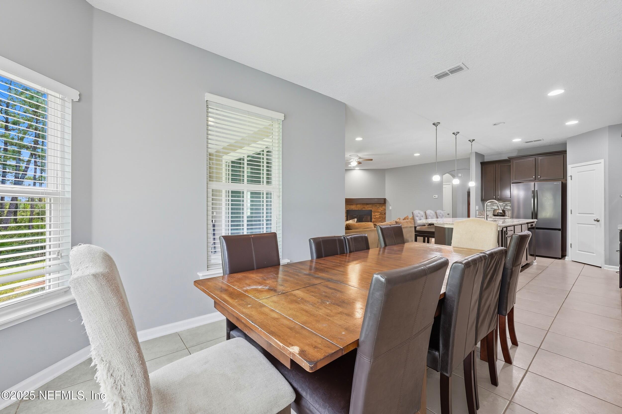 1218 Wetland Ridge Circle Middleburg, FL 32068 - Photo 27 of 75 Dining Area to Kitchen