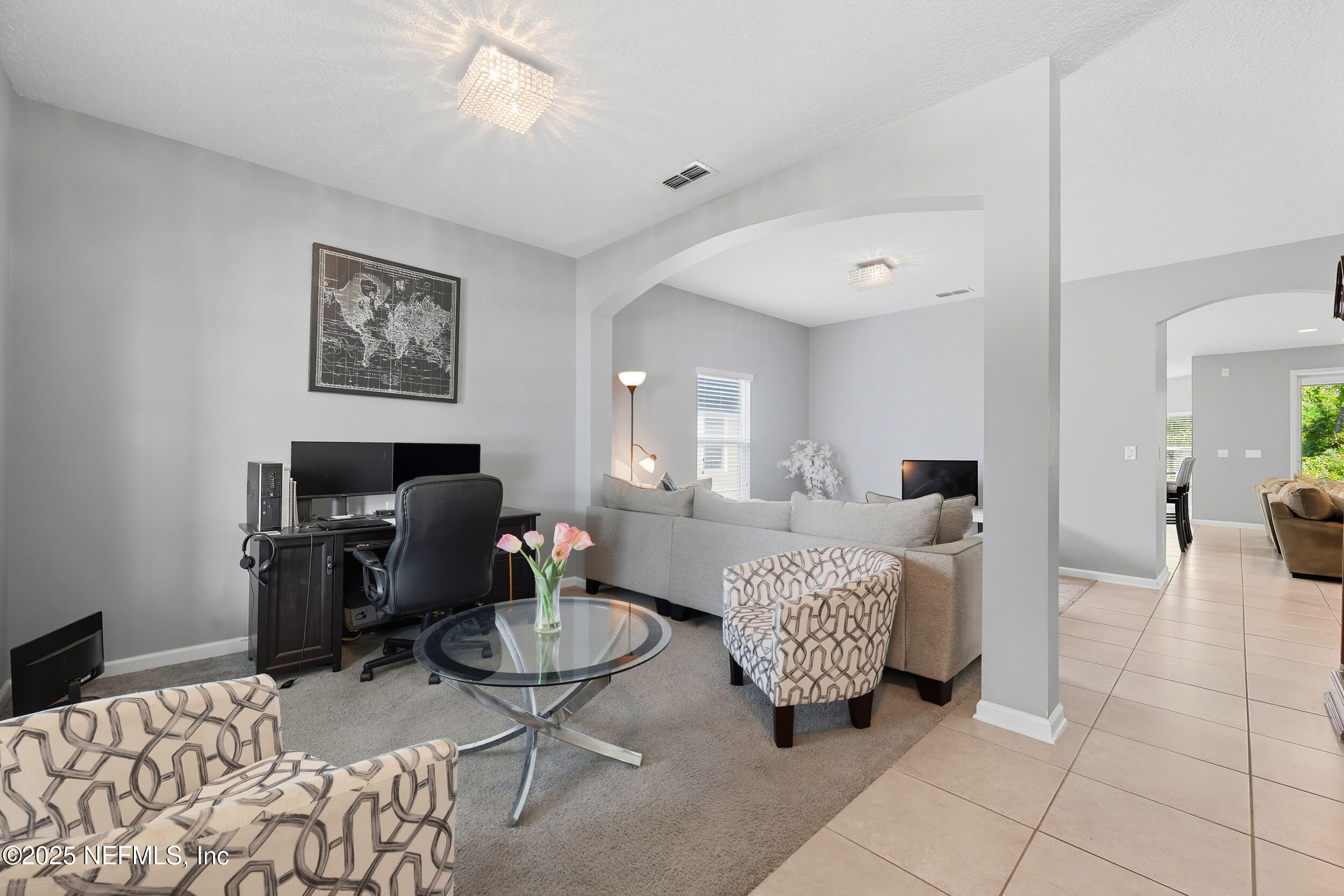 1218 Wetland Ridge Circle Middleburg, FL 32068 - Photo 9 of 75 a living room with furniture and a couch