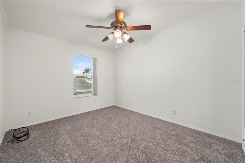 67 Windmill Boulevard Punta Gorda, FL 33950 - Photo 21 of 70 an empty room with a window