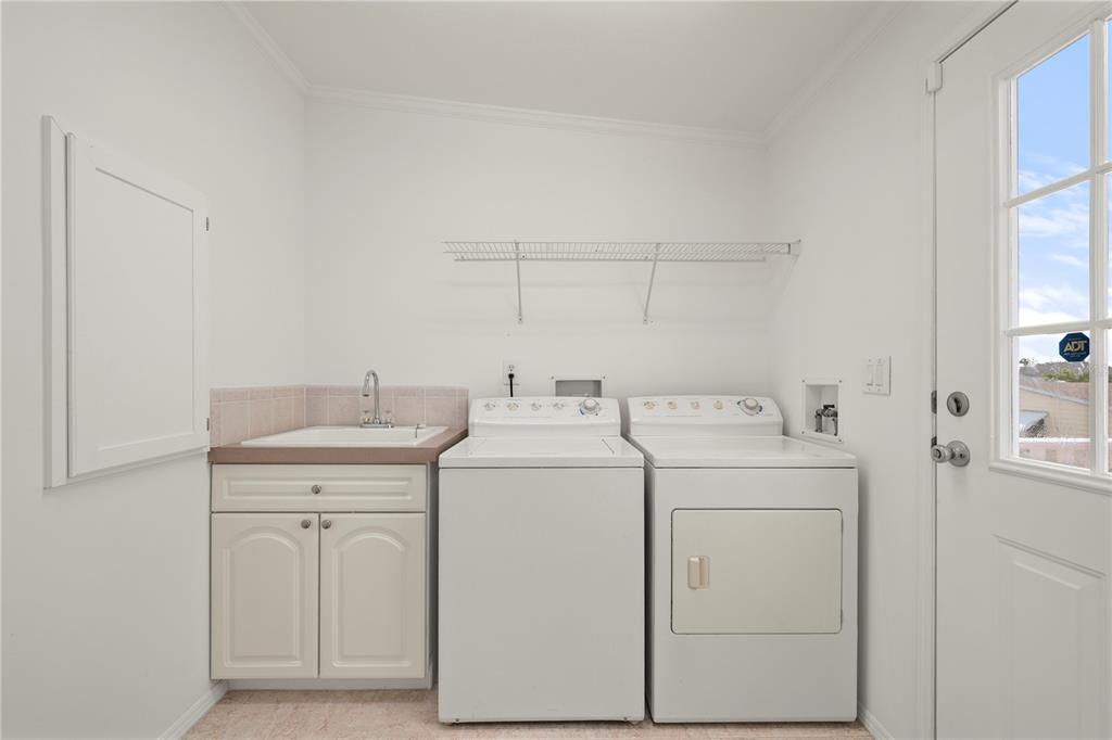 67 Windmill Boulevard Punta Gorda, FL 33950 - Photo 25 of 70 a utility room with dryer and washer