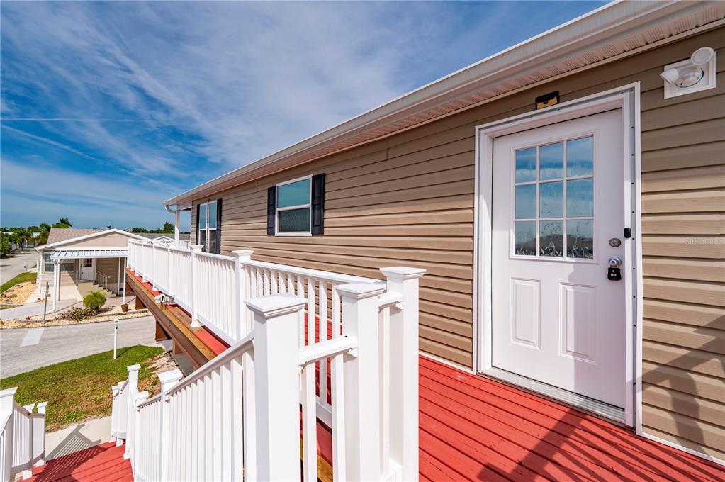 67 Windmill Boulevard Punta Gorda, FL 33950 - Photo 27 of 70 a view of a house with a deck