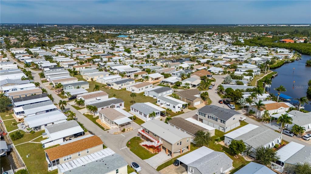 67 Windmill Boulevard Punta Gorda, FL 33950 - Photo 34 of 70 an aerial view of multiple house