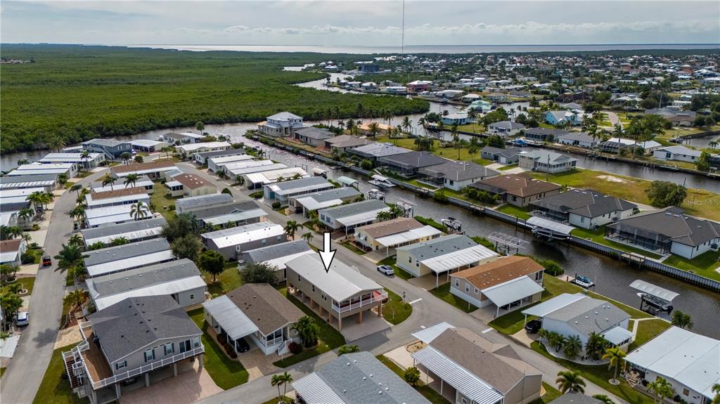 67 Windmill Boulevard Punta Gorda, FL 33950 - Photo 37 of 70 an aerial view of a residential houses with outdoor space
