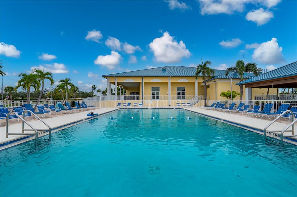 67 Windmill Boulevard Punta Gorda, FL 33950 - Photo 52 of 70 a view of a swimming pool with a patio