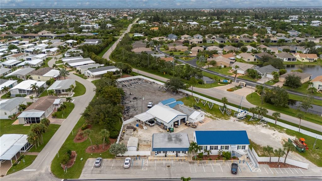 67 Windmill Boulevard Punta Gorda, FL 33950 - Photo 64 of 70 an aerial view of residential houses with outdoor space