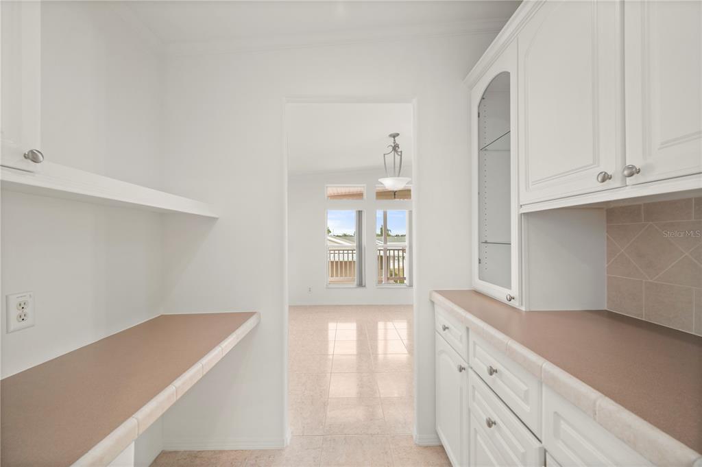 67 Windmill Boulevard Punta Gorda, FL 33950 - Photo 9 of 70 a view of a kitchen with cabinets and a window