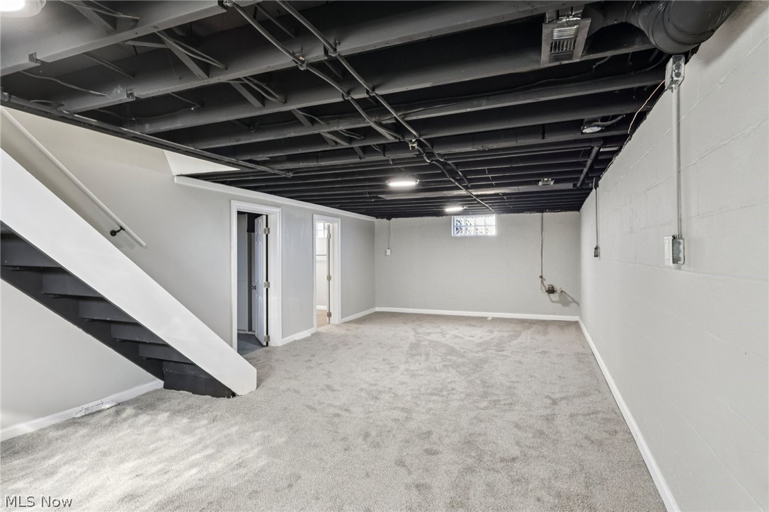 62 Jacobs Road Hubbard, OH 44425 - Photo 19 of 27 Basement with light carpet and baseboards