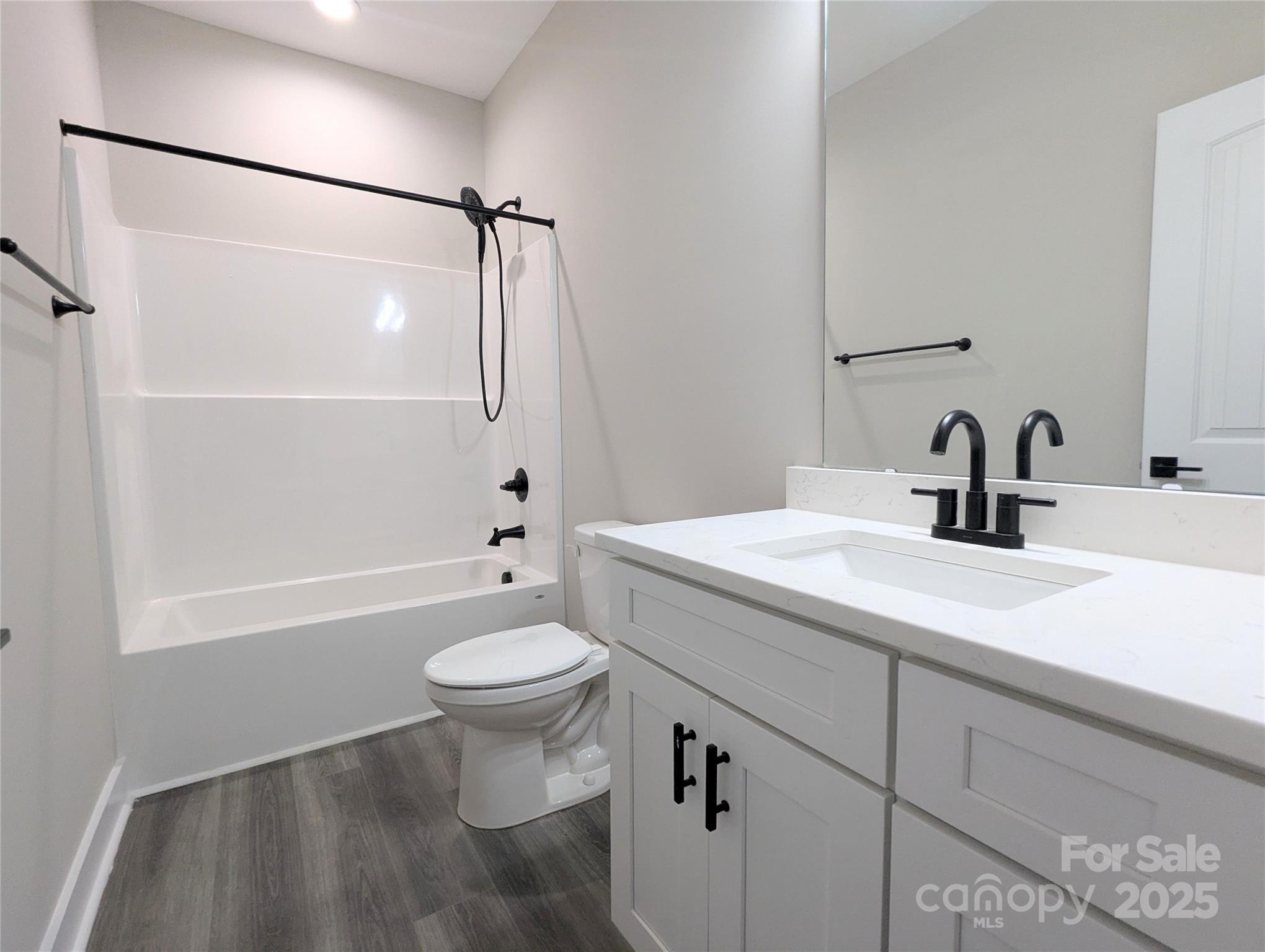 524 Waco Road Kings Mountain, NC 28086 - Photo 12 of 21 a bathroom with a sink a toilet and shower