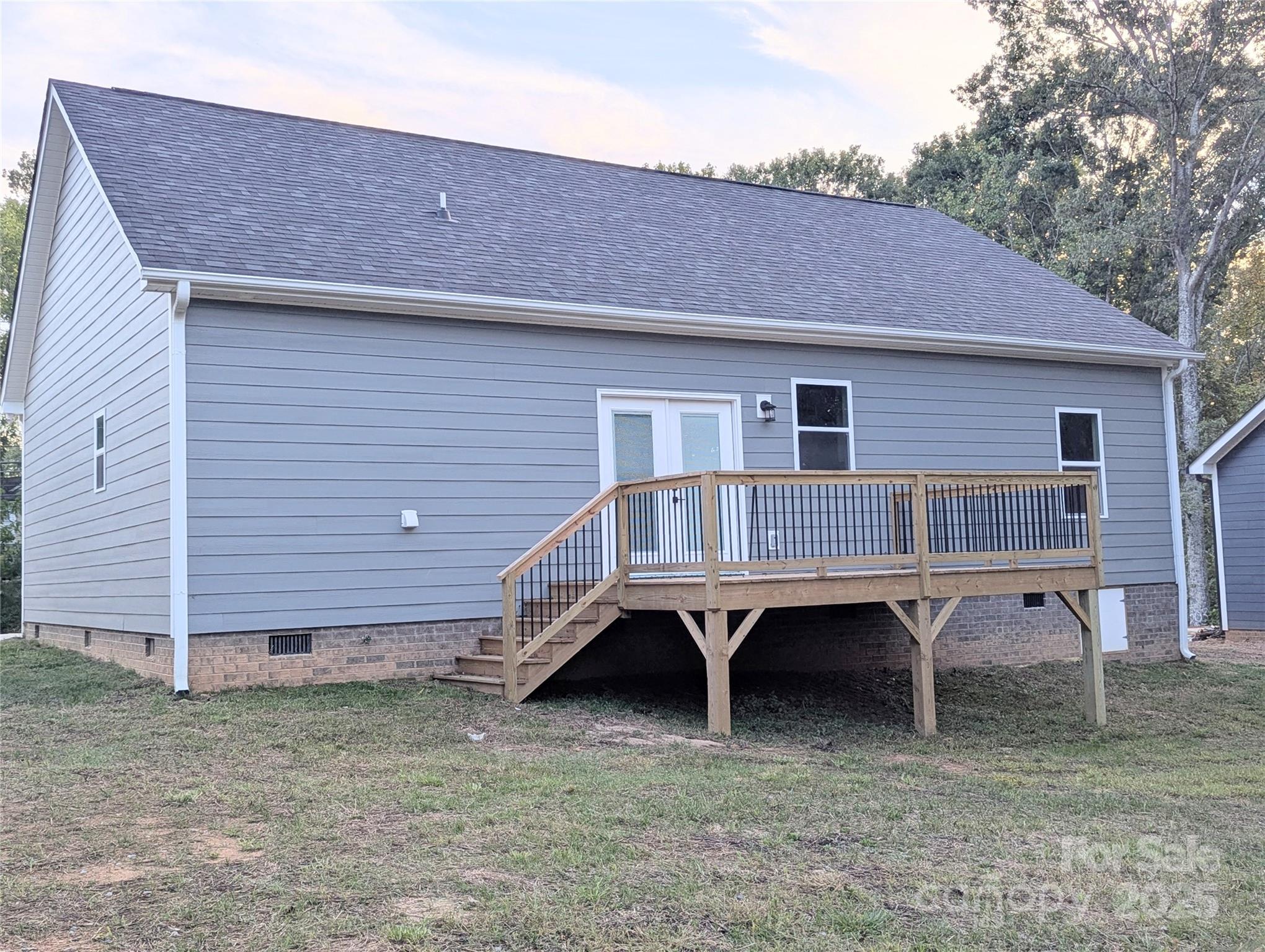 524 Waco Road Kings Mountain, NC 28086 - Photo 20 of 21 a backyard of a house with table and chairs