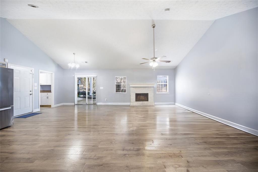 10 Stoneview Circle Covington, GA 30016 - Photo 11 of 25 a view of empty room with wooden floor