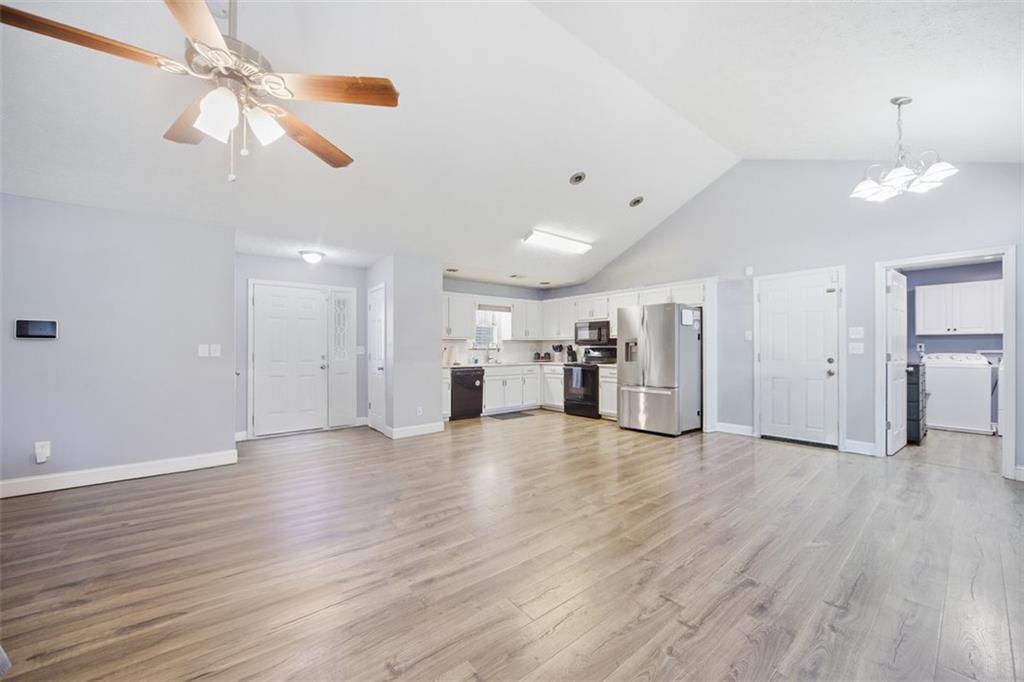 10 Stoneview Circle Covington, GA 30016 - Photo 10 of 25 a view of empty room with wooden floor