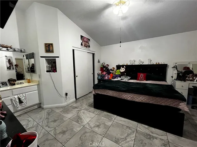 a living room with furniture fireplace and flat screen tv