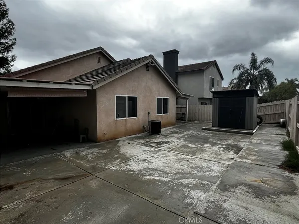 a view of a house with a patio