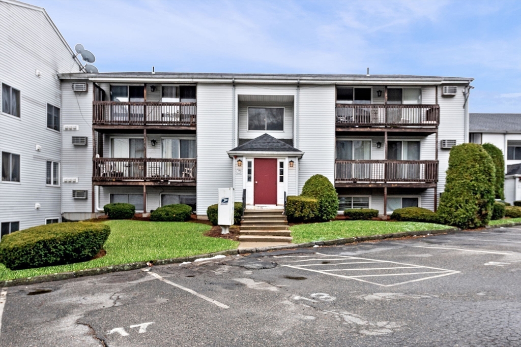 11 Gibbs Street, Unit C40 Worcester, MA 01607 - Photo 1 of 21 a front view of a house with garden