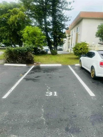 a view of a hallway with entryway