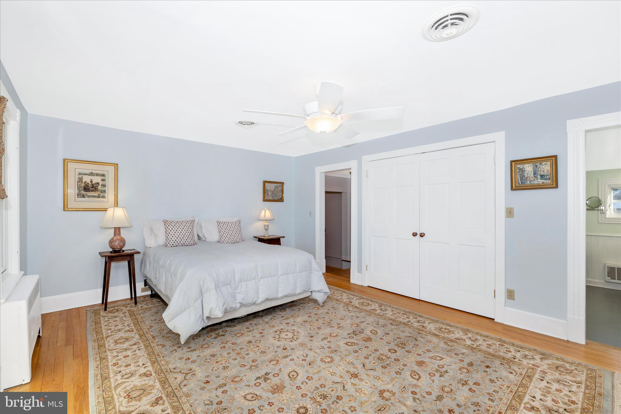 22170 Dickerson School Road Dickerson, MD 20842 - Photo 22 of 64 a bedroom with a large bed and a chandelier
