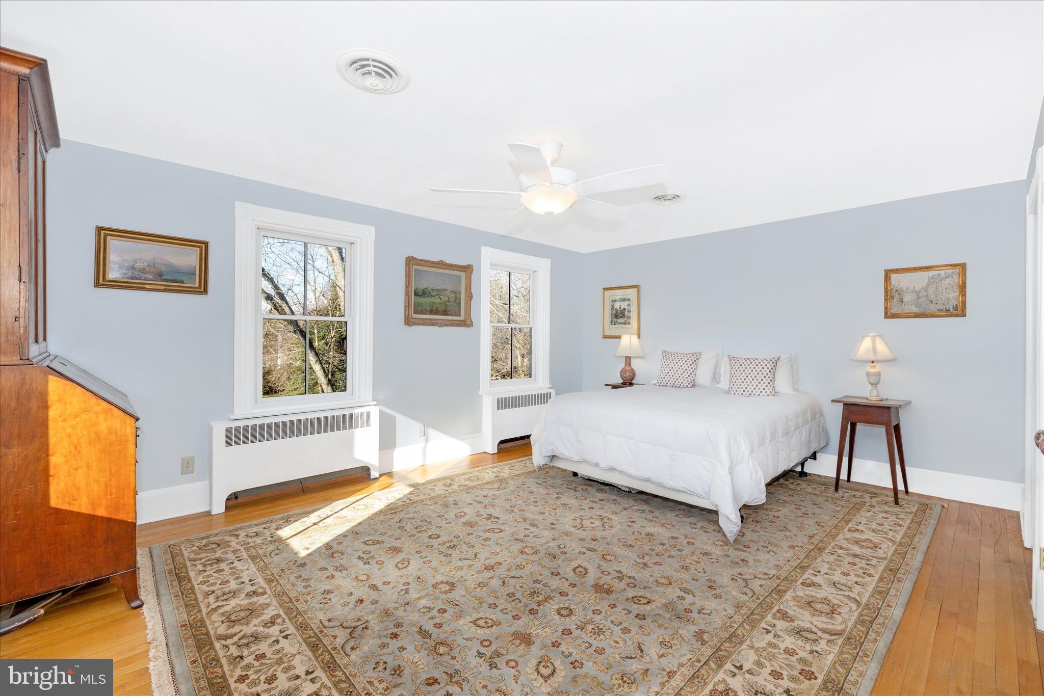22170 Dickerson School Road Dickerson, MD 20842 - Photo 24 of 64 a bedroom with a large bed a rug and a window
