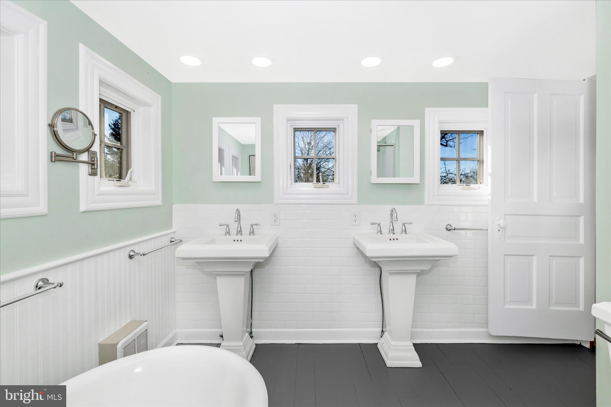 22170 Dickerson School Road Dickerson, MD 20842 - Photo 26 of 64 a bathroom with a toilet sink and mirror