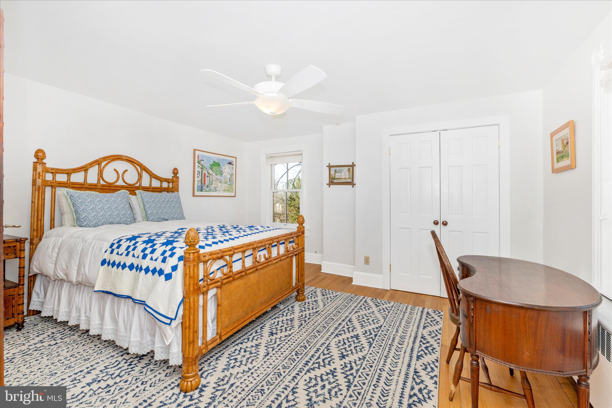 22170 Dickerson School Road Dickerson, MD 20842 - Photo 27 of 64 a bedroom with a bed and wooden floor