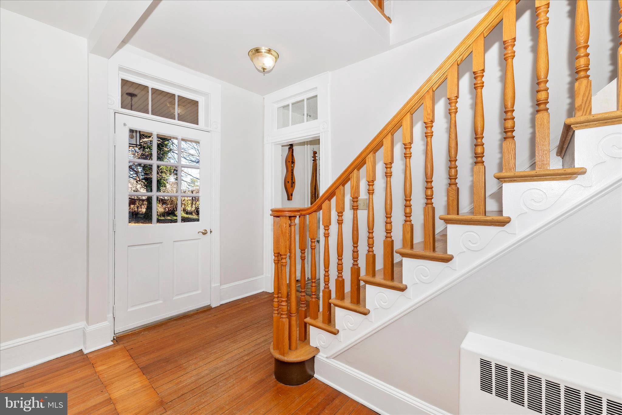 22170 Dickerson School Road Dickerson, MD 20842 - Photo 3 of 64 a view of entryway with wooden floor and stairs