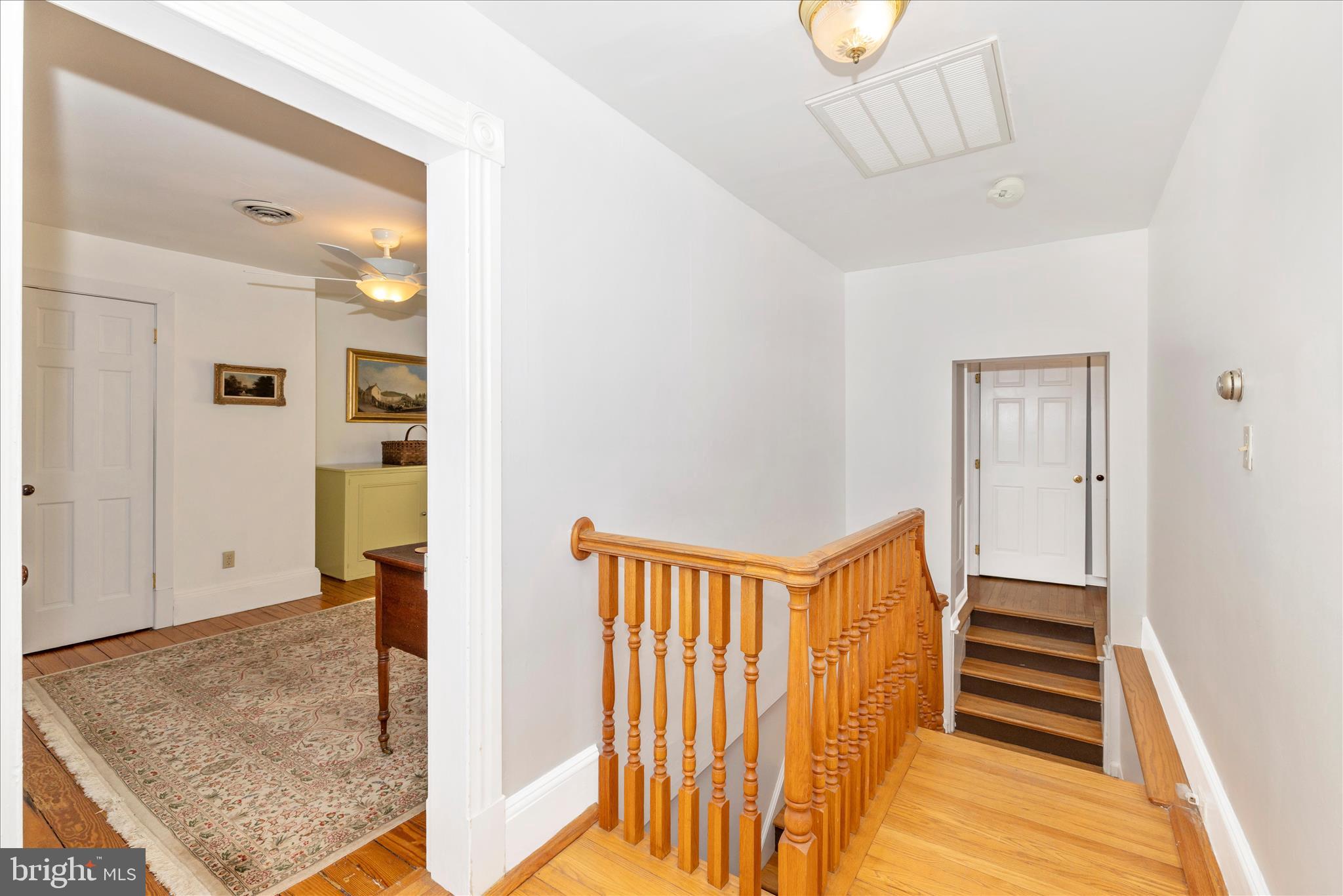 22170 Dickerson School Road Dickerson, MD 20842 - Photo 33 of 64 a view of a hallway with entryway wooden floor and cabinet