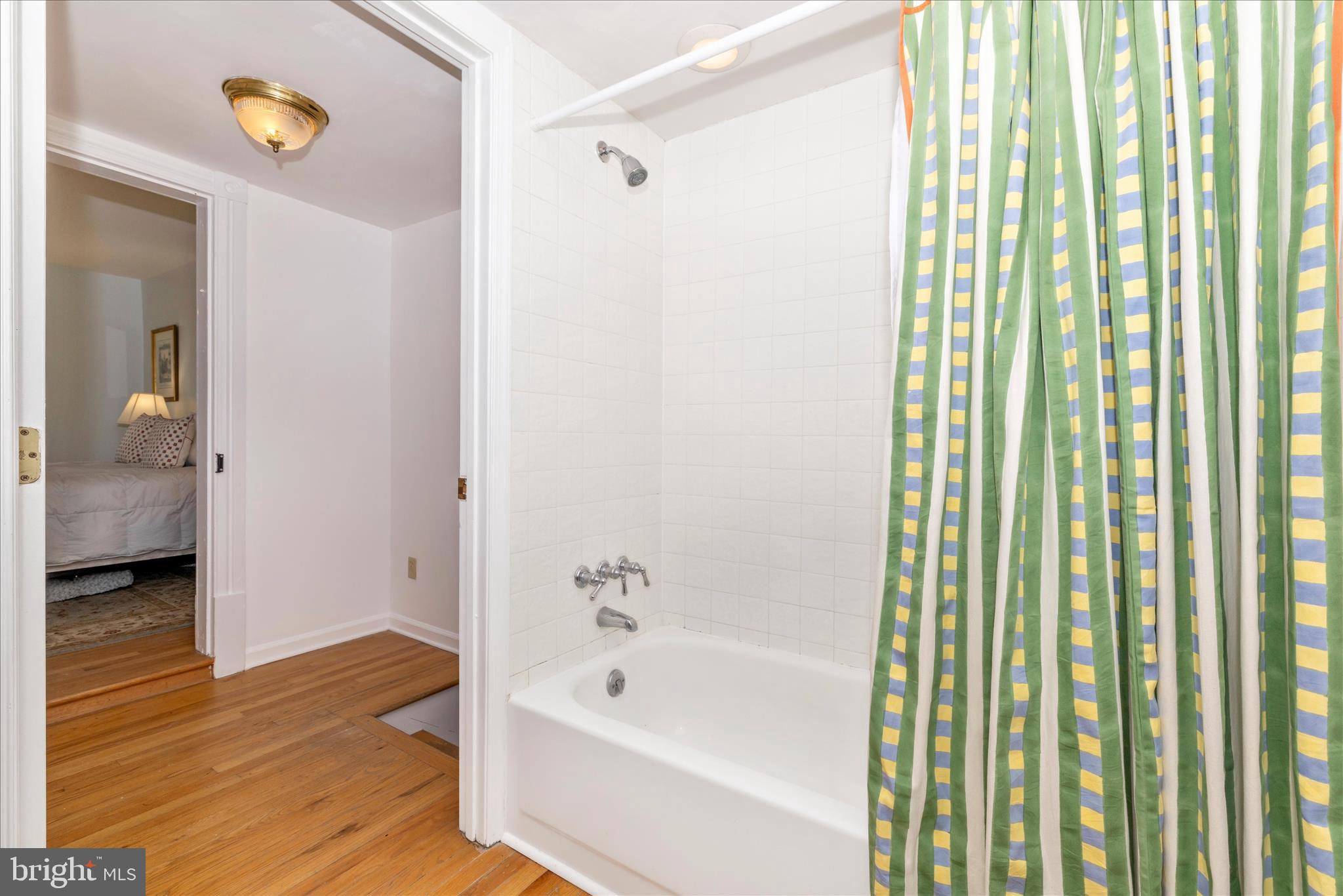 22170 Dickerson School Road Dickerson, MD 20842 - Photo 35 of 64 a bathroom with a bathtub and a shower