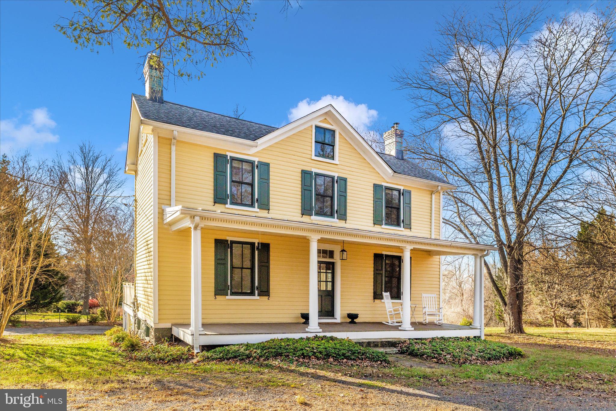 22170 Dickerson School Road Dickerson, MD 20842 - Photo 36 of 64 a front view of a house with a yard