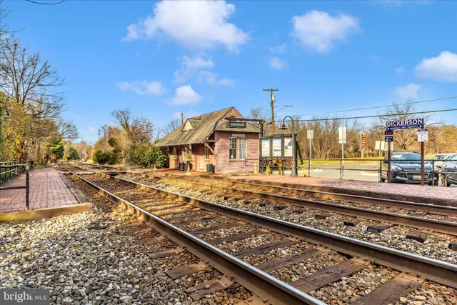an aerial view of a house with outdoor space