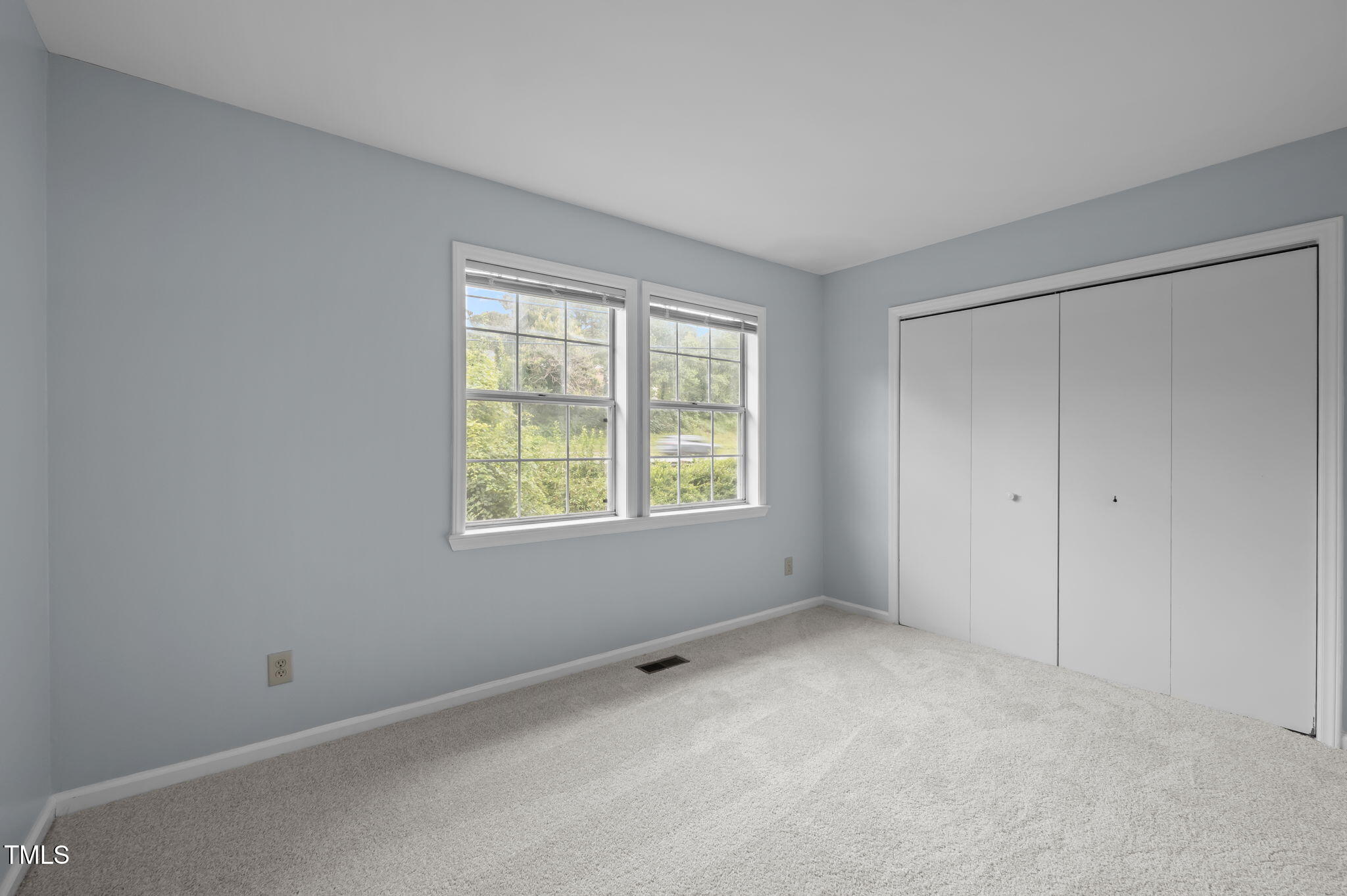 115 Coleridge Court Carrboro, NC 27510 - Photo 18 of 33 a view of an empty room with a window