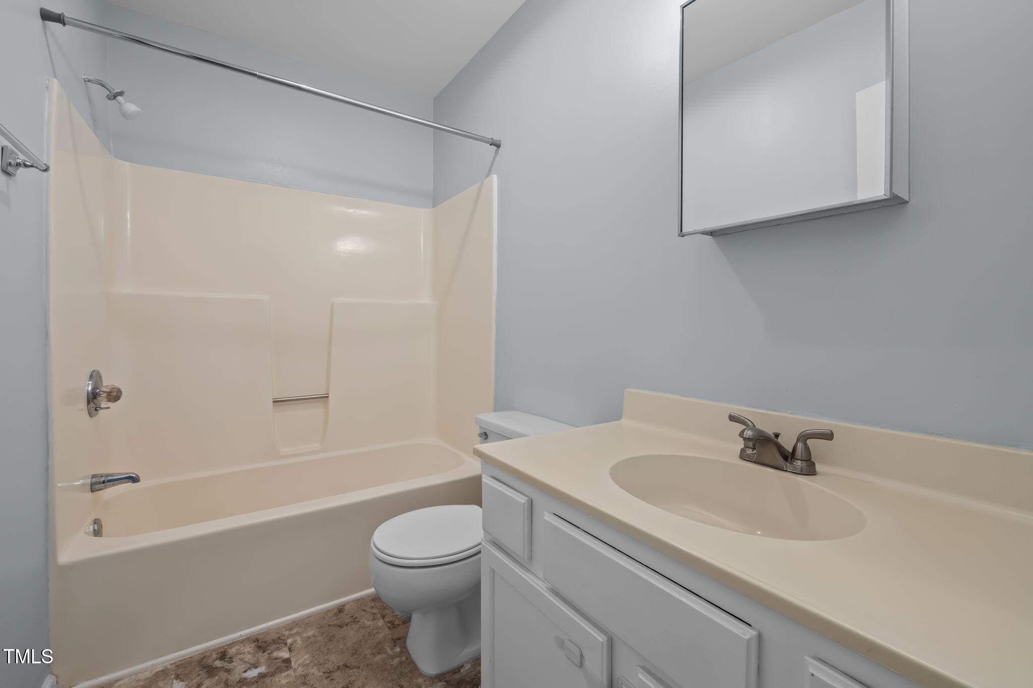 115 Coleridge Court Carrboro, NC 27510 - Photo 21 of 33 a bathroom with a sink a toilet and shower