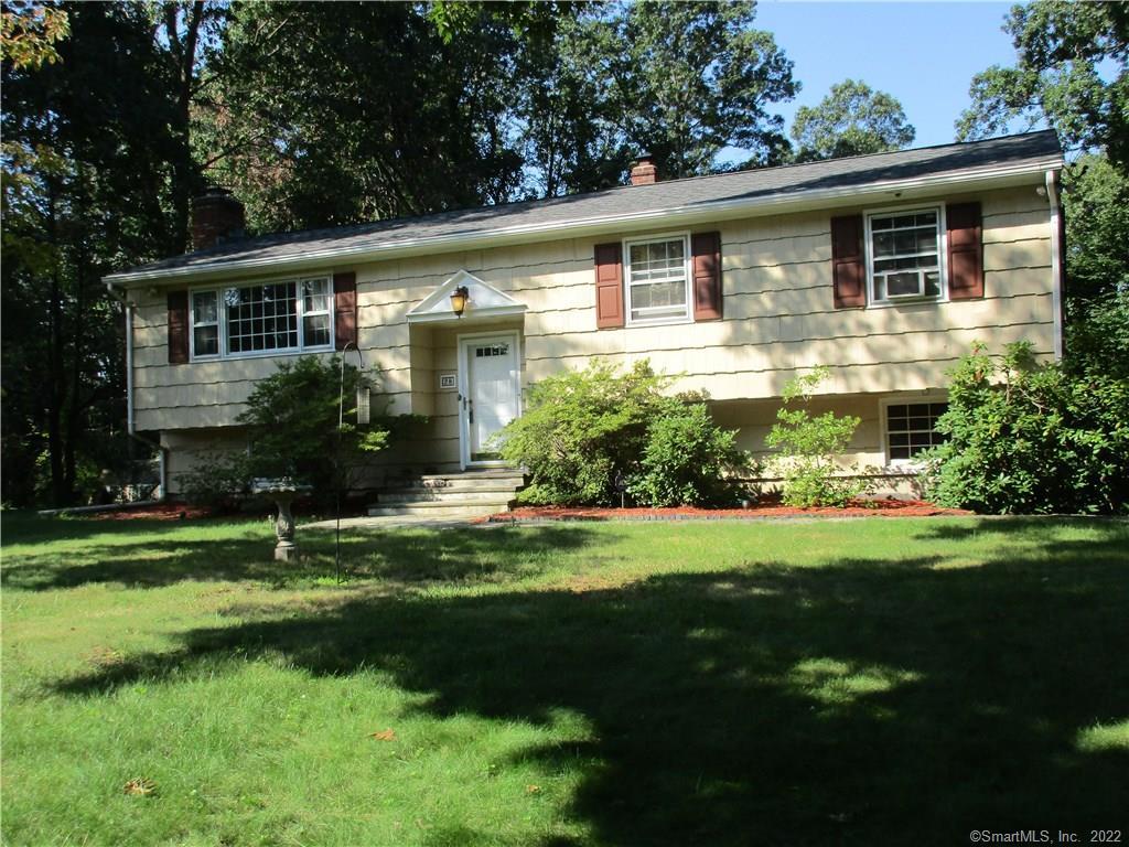 28 Ridgedale Road Bethel, CT 06801 - Photo 1 of 1 a front view of a house with a yard and green space
