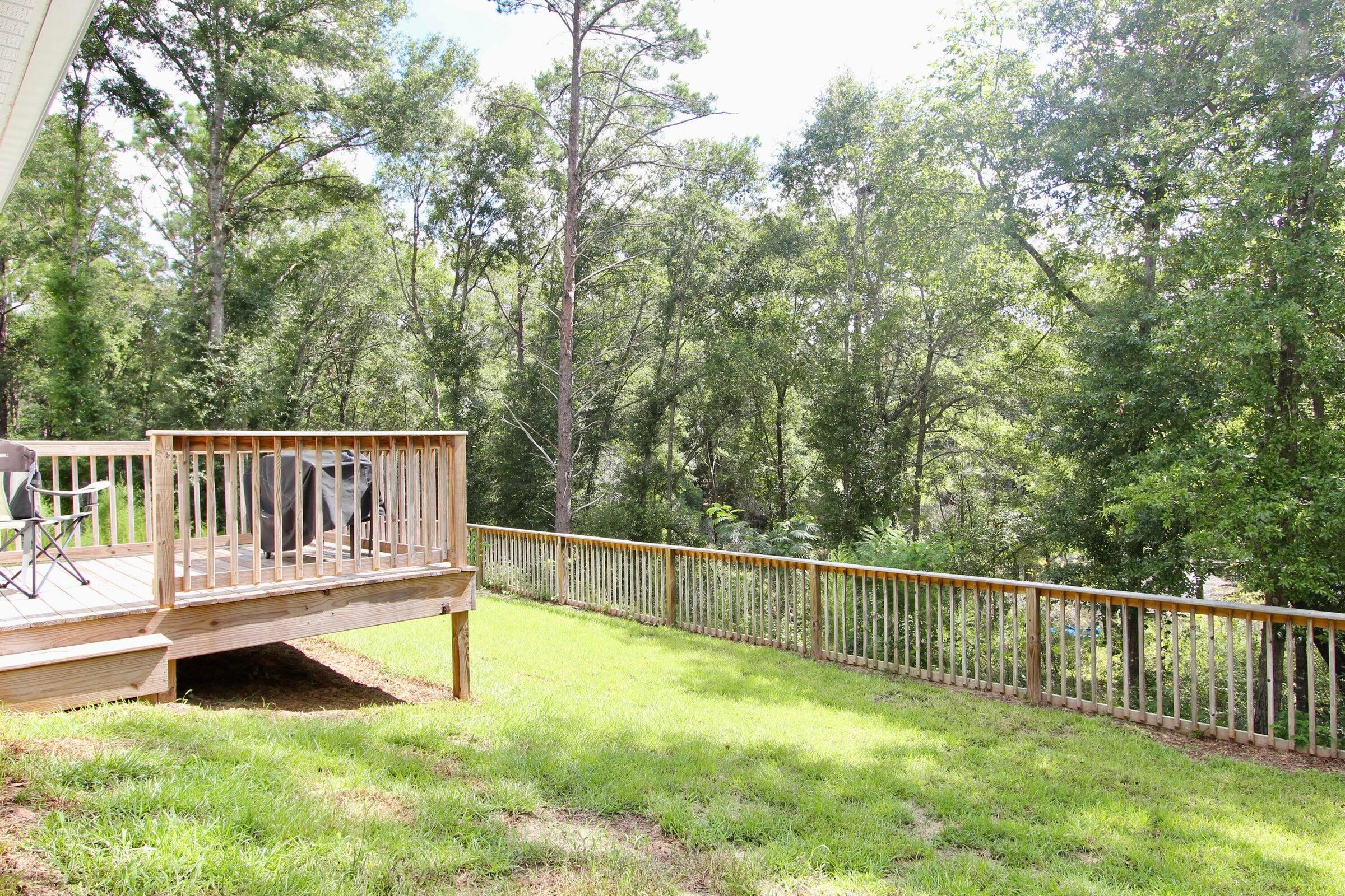102 Windsor Drive Crestview, FL 32539 - Photo 23 of 25 a view of deck with a fence