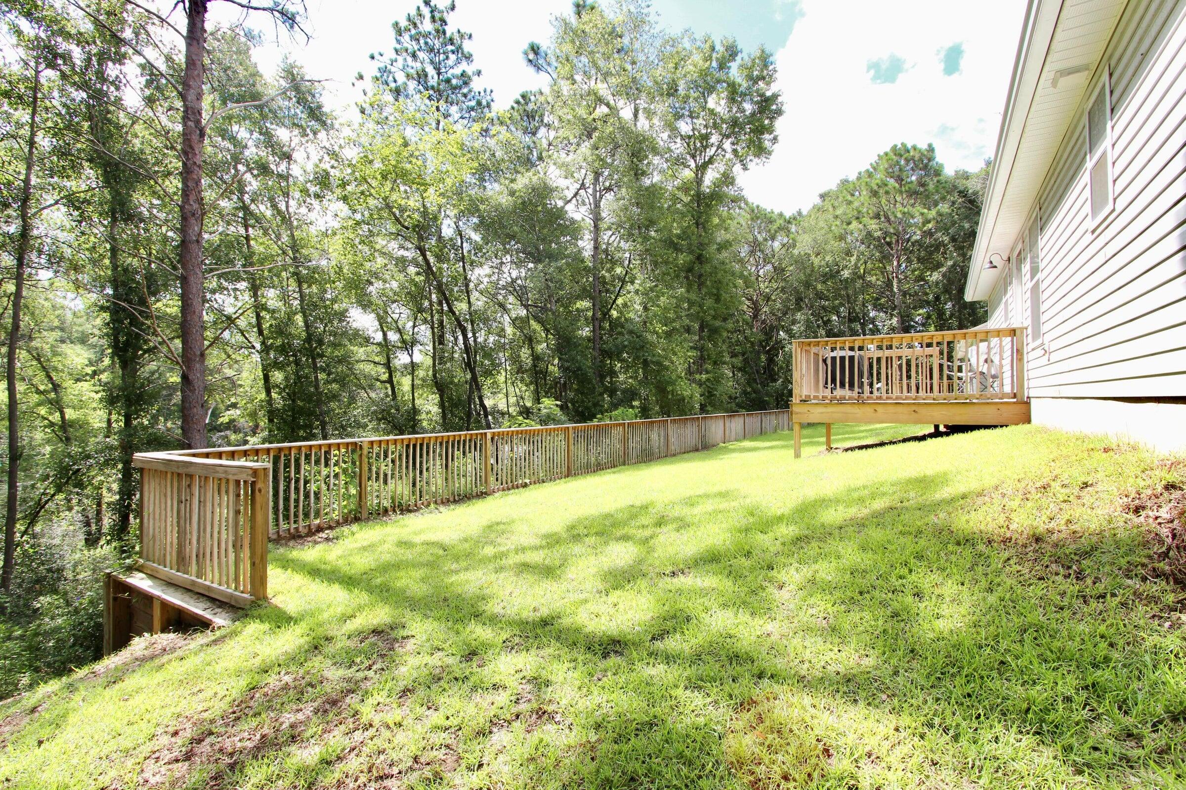 102 Windsor Drive Crestview, FL 32539 - Photo 25 of 25 a view of a backyard with swimming pool