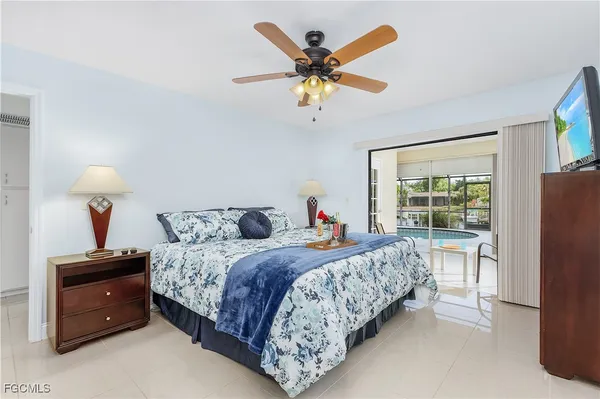 a bedroom with bed and a window