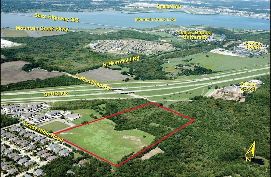 a view of a golf club with a big yard