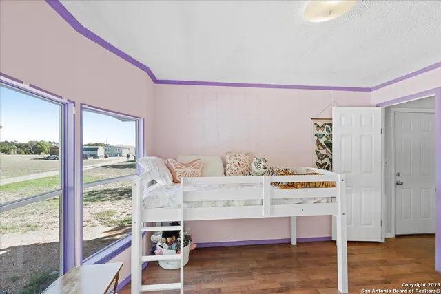 a bathroom with a sink a mirror and a shower