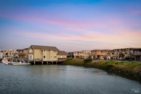a view of a lake with a city view